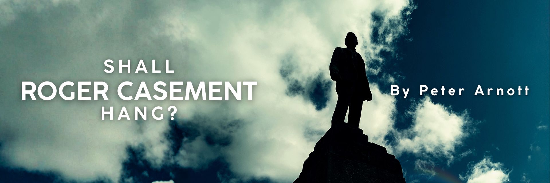 Statue of Roger Casement silhouetted against clouds and a blue sky